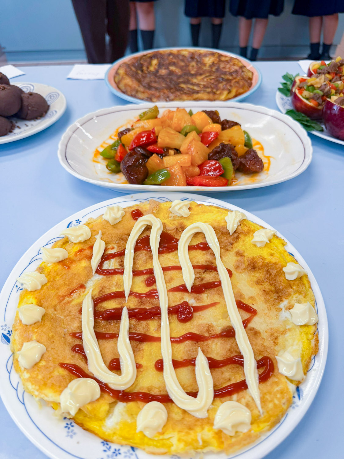 Culinary Artistry and Collaboration: Teacher-Student Cooking Competition